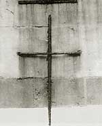 Croce utilizzata per misurare le stoffe situata sulla facciata della Chiesa di S. Cristoforo